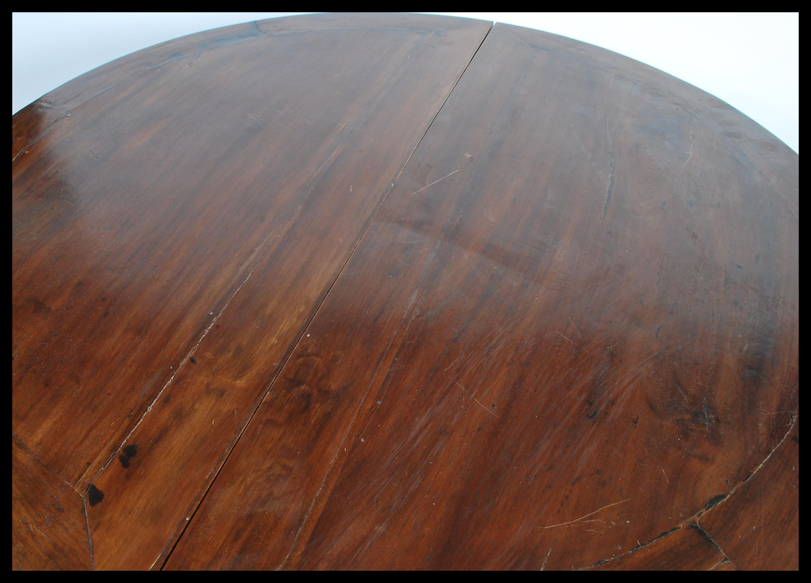 A large antique 20th century Chinese circular dining table from the Zhejiang province. The table - Image 3 of 6