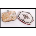 A 19th century Victorian mother of pearl ladies purse, with scrolling armorial silver inlay and