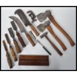 A group of vintage 20th century tools to include Bilhook's Axes, hammer , chisels , etc. Please