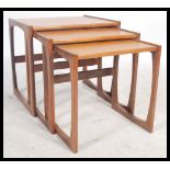 A G-Plan retro teak wood 1970's graduating nest of tables in the Quadrille pattern. The tables