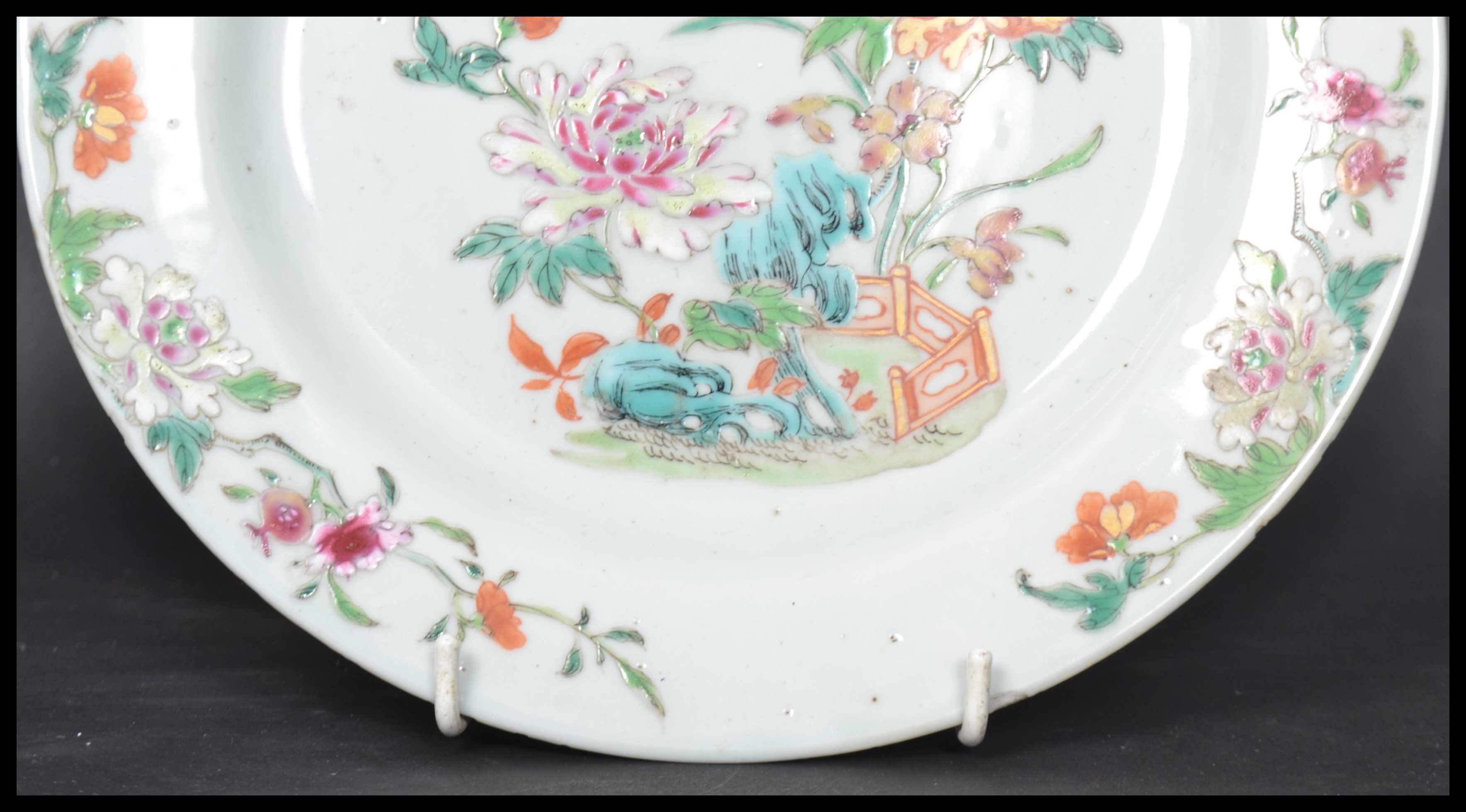 An 18th century Chinese Qing Long Famille Rose plate hand painted with enamels depicting floral - Image 6 of 8