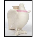 A 19th century Royal Worcester ivory porcelain dove vase being modelled as a dove with its out