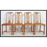 A 1920's set of 4 Edwardian oak Queen Anne Revival  barleytwist legs united by h-stretchers having