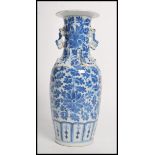 A 19th century Chinese ceramic vase having twin dr