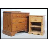 An antique style pine country cottage chest of drawers having 2 short drawers over deep drawers