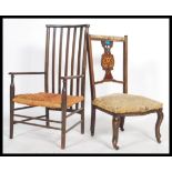 An early 20th century Arts & Crafts Macintosh revival nursing chairs with scrolled elbow rests