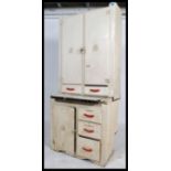 A mid 20th century painted pine kitchen work unit storage cupboard having a painted white finish