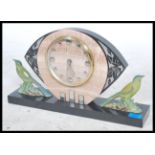 An early 20th century 1930's  Art Deco Verdigris mantel clock raised on a marble base with painted