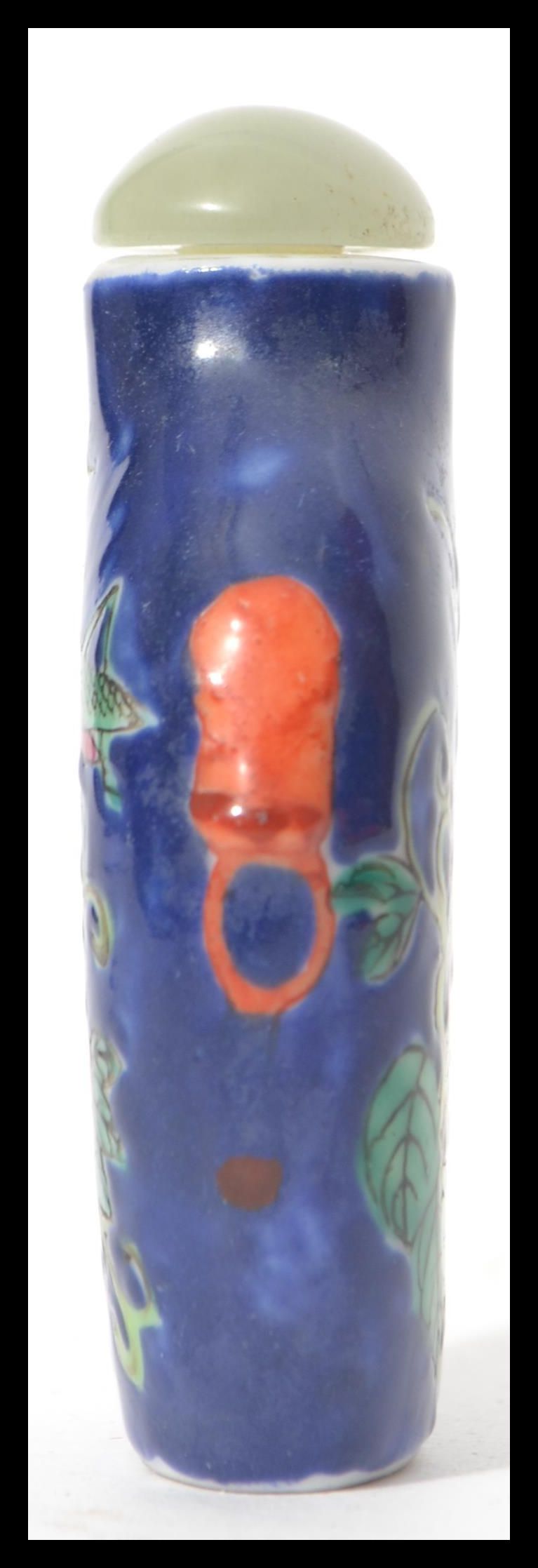 A Chinese porcelain snuff - perfume bottle with glass stopper with dabber stem. Blue ground with - Image 4 of 7