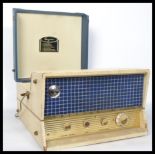 A vintage 1950's two tone Emerson Hi-Fidelity portable record player. The vinyl case blue and