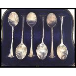 A rare set of six early 20th century silver hallmarked shell pattern tea spoons by  William Hutton &