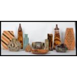 A good collection of studio pottery by potter Cynthia Scattergood, several pieces to include