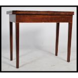 A 19th century Georgian mahogany and line border inlaid games - card table. Raised on square