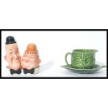 A vintage 20th century novelty Beswick Laurel and Hardy salt and pepper cruet set together with a