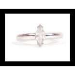 A hallmarked 9ct white gold and CZ ring having single marquise cut CZ. Hallmarked London. Weight 2.