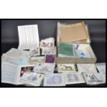 A collection of first day covers / issues and postal stamps to include full sheets dating from the