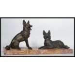 A Vintage early 20th century 1930's Art Deco spelter diorama figurine of dogs raised on a large