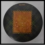 A 19th Century Victorian Mauchline Ware, Tartanware Gordon tartan stamp box of circular form.