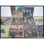 Vinyl Records A collection of ten vinyl long play / LP vinyl records pertaining to The Beatles to