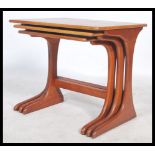 A retro 20th century nest of three E Gomme for G-Plan teak tables, the rectangular tops on