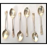 A set of six silver hallmarked 1930's tea spoons in the Hanoverian pattern having elongated rat