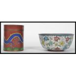 Two Oriental Chinese cloisonne items to include a lidded pot of cylindrical from having a dragon