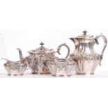 An Edwardian matching four piece silver plated tea service, consisting of teapot, water pot, sugar