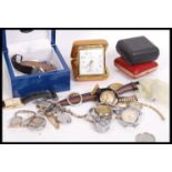 A collection of vintage 20th century watches to include a Rotary boxed watch , nurses watch , travel