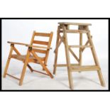 A vintage 20th century folding wooden step ladder / library steps of small proportions together with