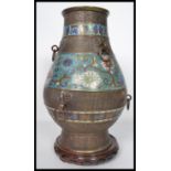 A 19th century Chinese archaistic bronze vase of baluster form. With multiple ring drop handles