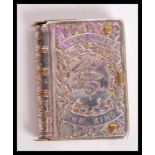 A silver plated commemorative vesta case in the form of a book with notation reading 'Long Live