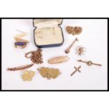 A collection of yellow metal jewellery to include a boxes pair of 9ct gold earrings a 9ct gold