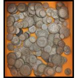 A large collection of vintage silver and copper British coins dating from the 19th century to