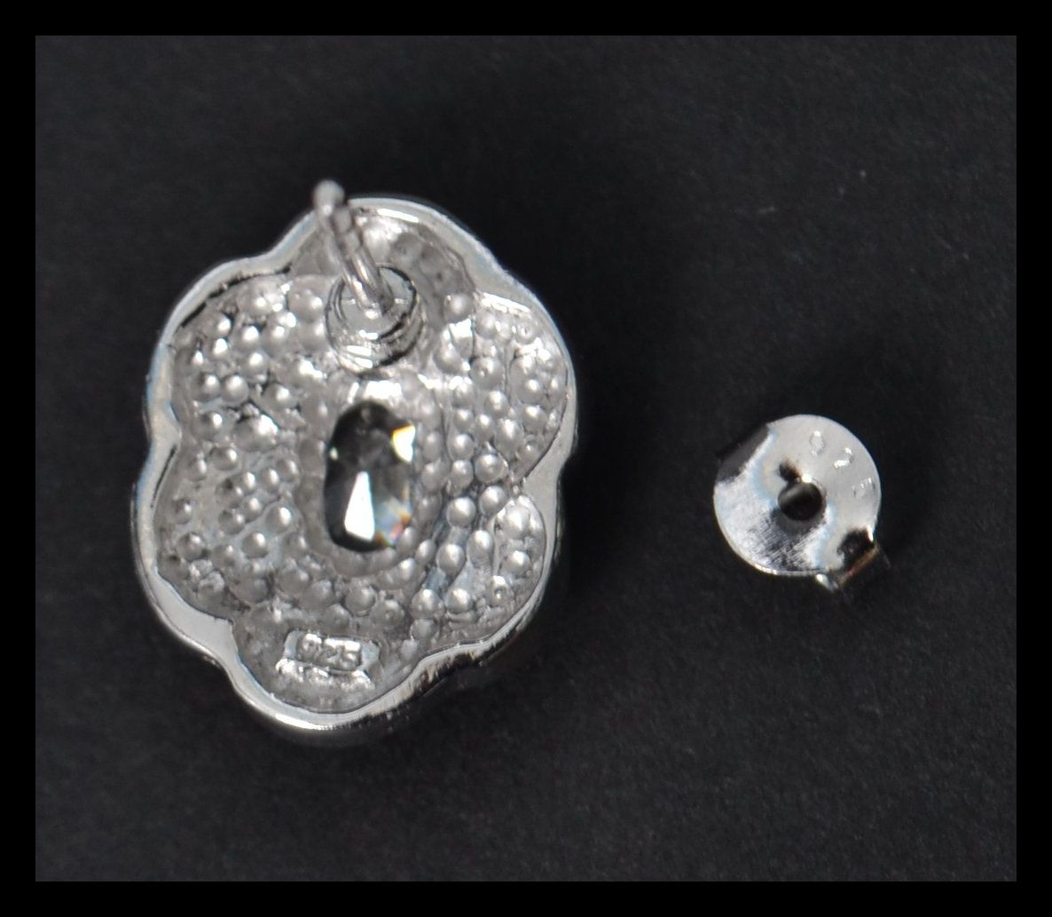 A pair of silver and enamel set stud earrings in the form of flowers having central white stones. - Image 3 of 4