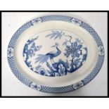 An early 20th century Woods and Sons Yuan pattern blue and white ceramic dinner platter tray plate