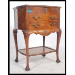 A 1920's solid oak Queen Anne revival canteen table cabinet. The cutlery canteen by Joseph Rodgers &