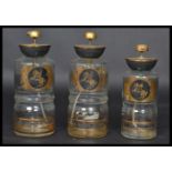 A set of three vintage glass and gilt metal aftershave / Cologne atomisers retaining  all applied