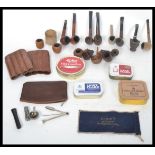 A good collection of tobaccco smoking pipes in burr walnut to include names, Dunhill , Big Ben and