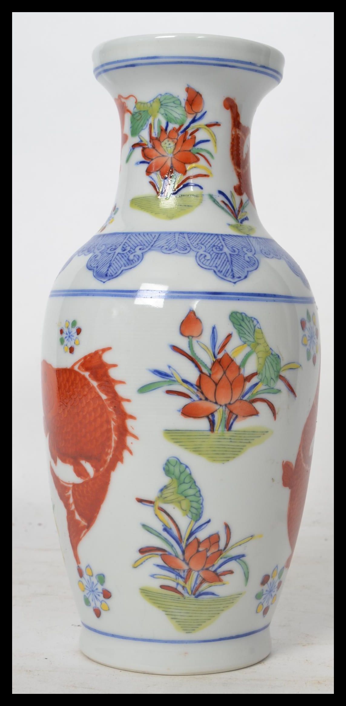 A 20th century Chinese vase decorated with scenes of carp and weeds with ochre red character marks - Image 4 of 6