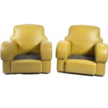 A pair of stunning 1930's Art Deco club armchairs. The chairs with stunning shaped armrests and club