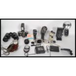 A good collection of vintage and retro 20th century cameras to include a  Canon camera p model no.