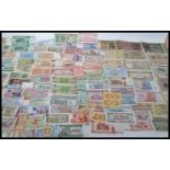 A collection of bank notes from around the world to include China 1 Fen notes x 4, British Armed
