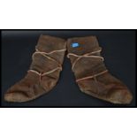 A pair of believed 19th century Inuit style / Canadian ' Mukluk ' leather hide boots / shoes. Simple
