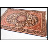 A large Iranian / Persian Keshan carpet - rug having blue ground with geometric decoration and
