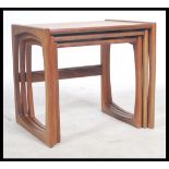 A G-Plan retro teak wood 1970's graduating nest of tables in the Quadrille pattern. The tables