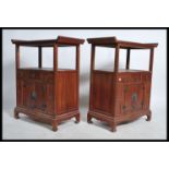 A pair of believed 19th / early 20th century Chinese elm  wood pedestal bedside / side cabinet