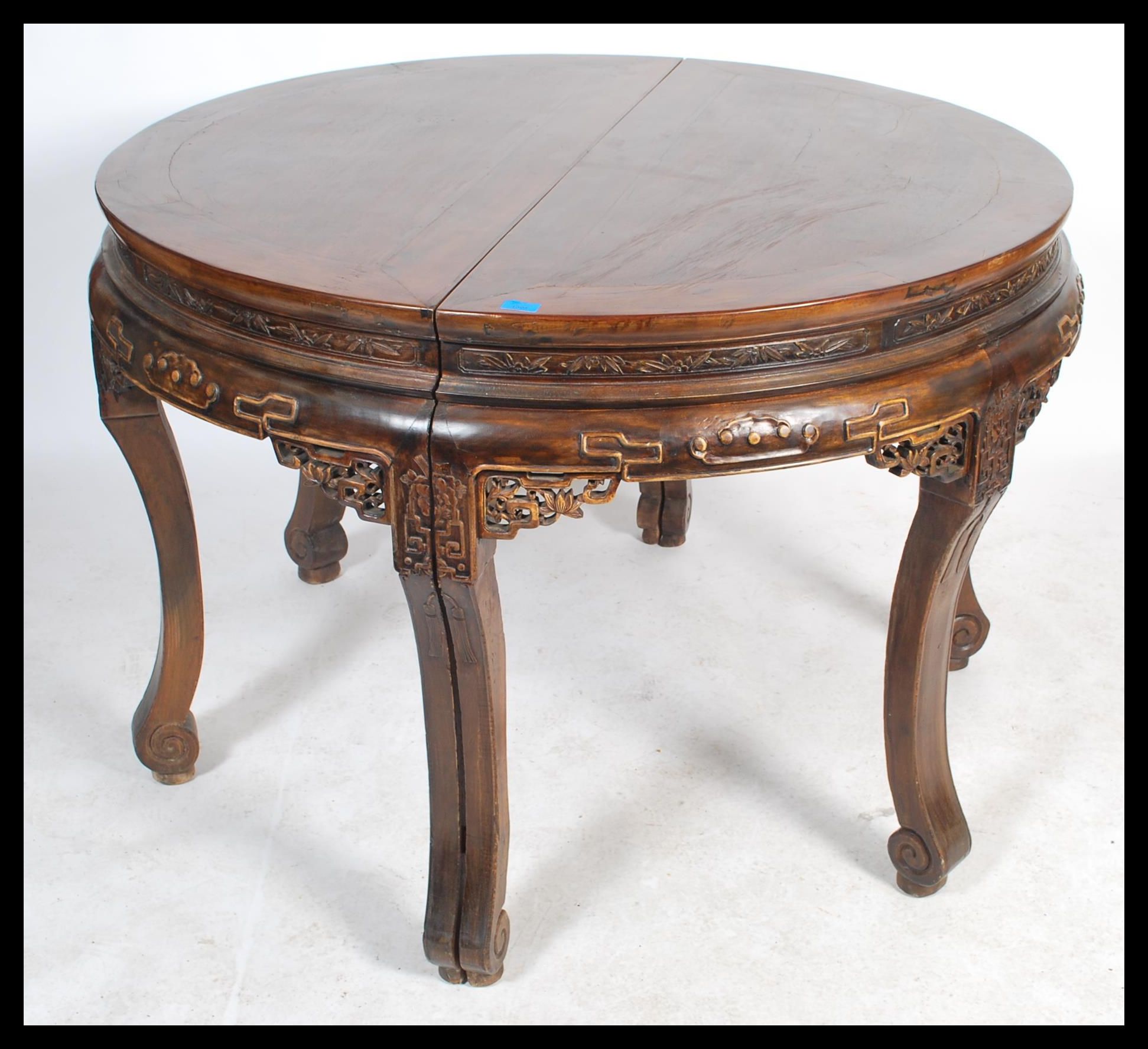 A large antique 20th century Chinese circular dining table from the Zhejiang province. The table - Image 2 of 6