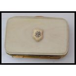 A vintage 19th century ivory and gilt metal purse