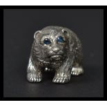 A sterling silver figure in the form of a grizzly