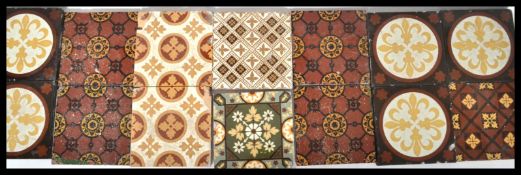 A collection of Victorian majolica tiles, includin